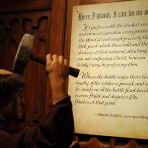 Protestant Reformation Begins: Martin Luther Nailed his 95 Theses to the Door of the Wittenberg Castle Church, Protesting the Sale of Indulgences and Other Practices
