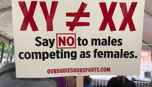Female Athletes Speak Out at ‘Our Bodies, Our Sports’ Rally on Title IX Anniversary